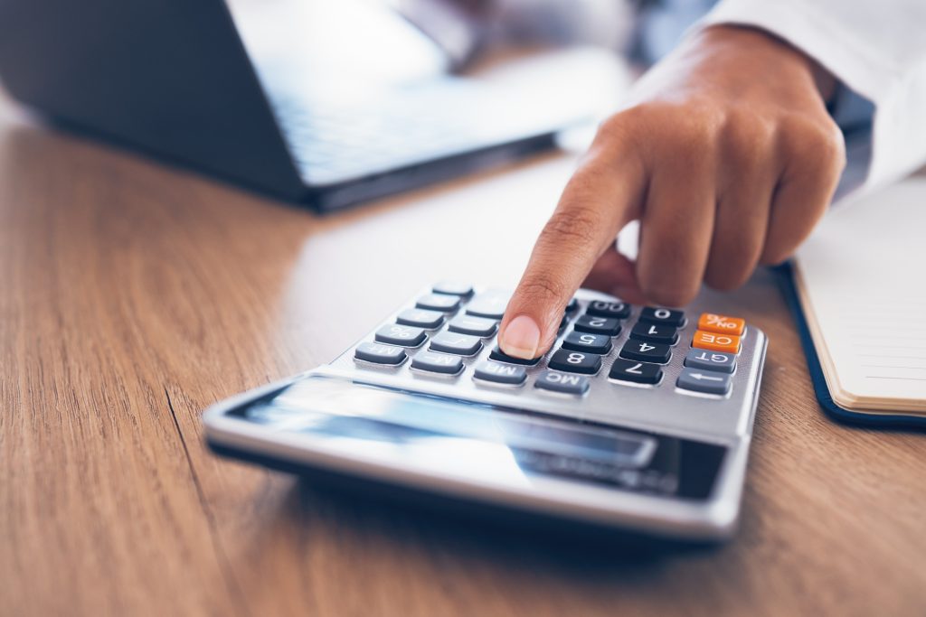 Administration hands, calculator and typing person calculating bookkeeping finance, bank payroll or