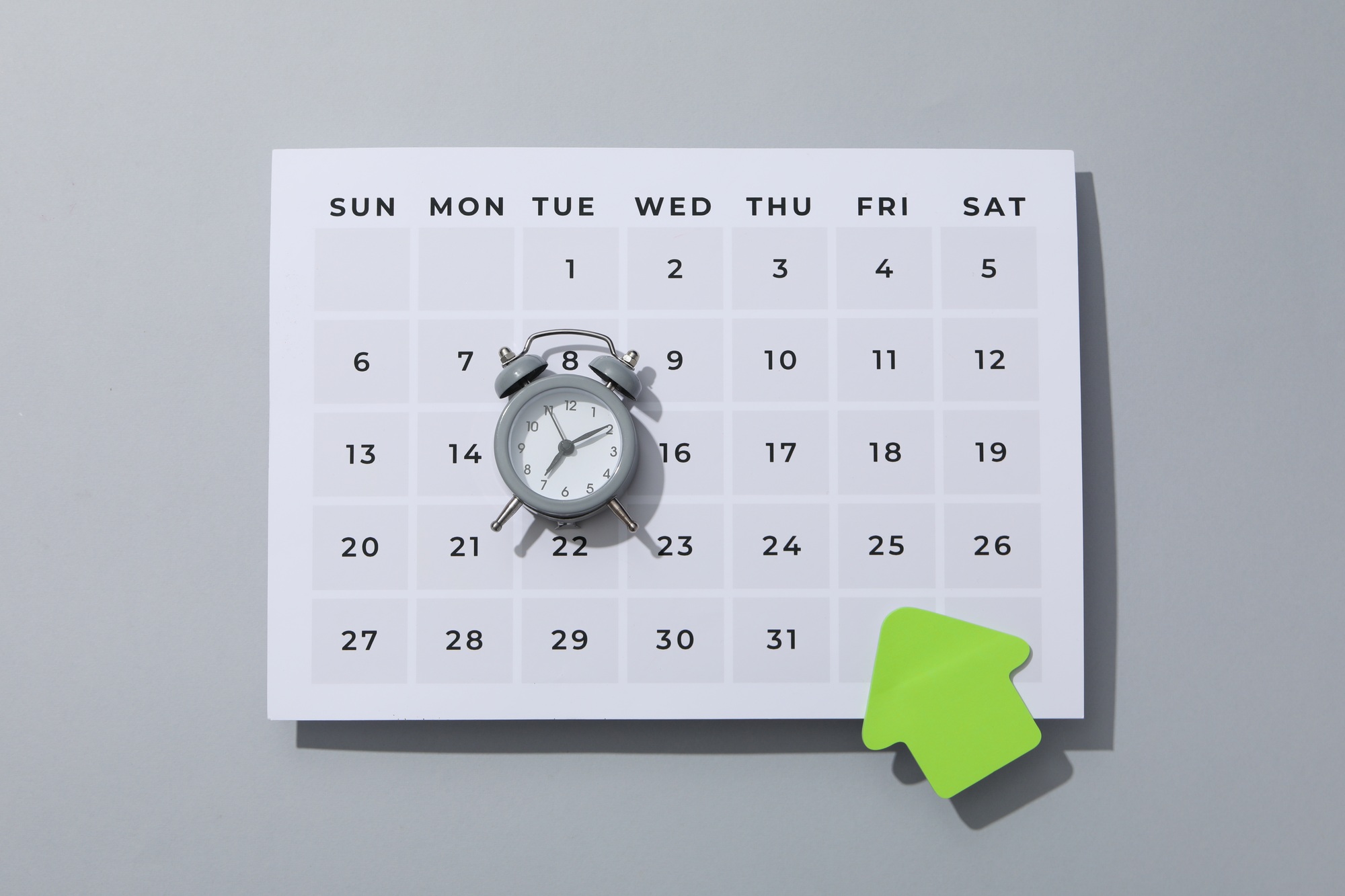 Concept of time management with alarm clock