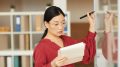 Successful Asian Businesswoman Planning Project